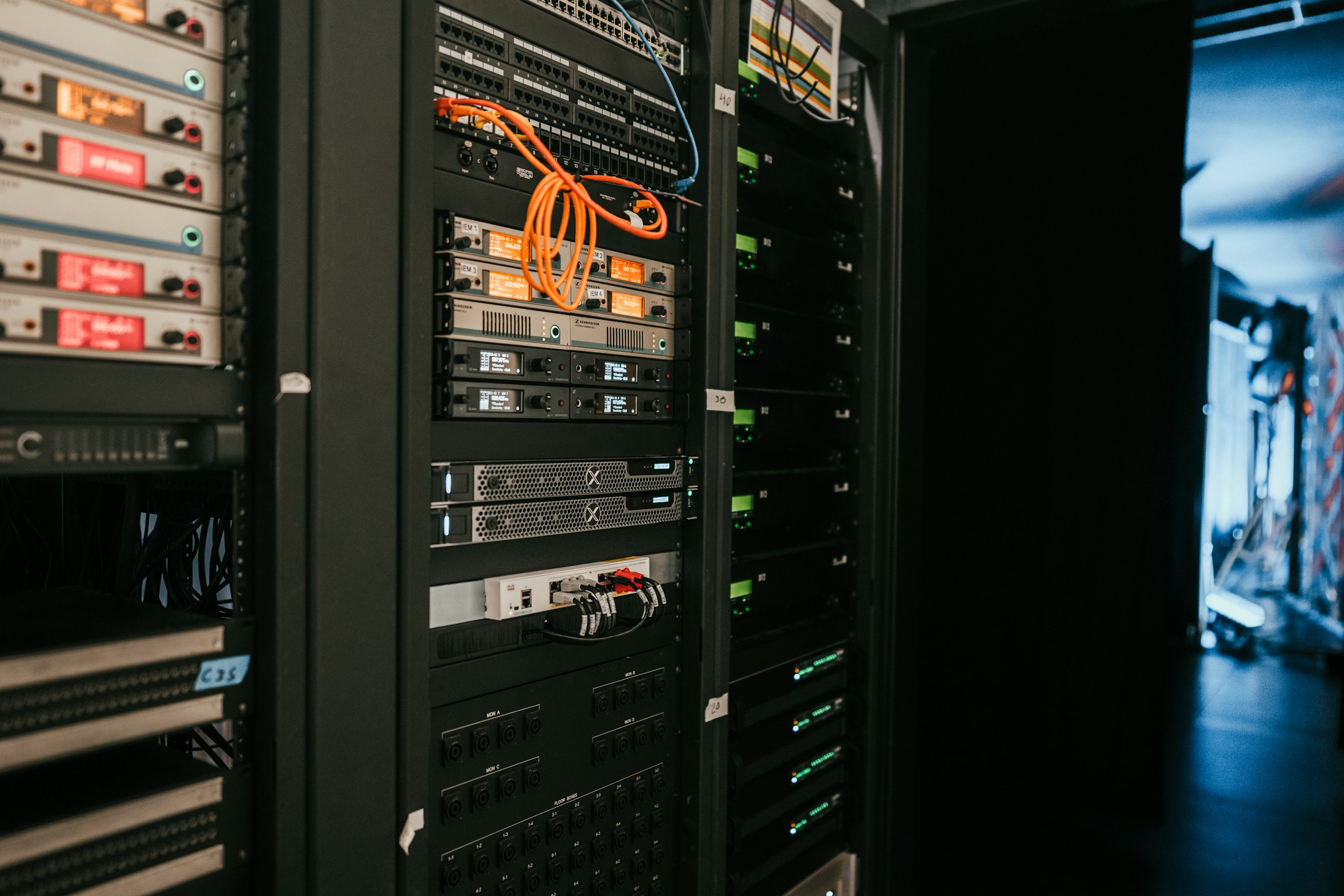 Server rack with illuminated indicators, the infrastructure underneath every asset class we operate in