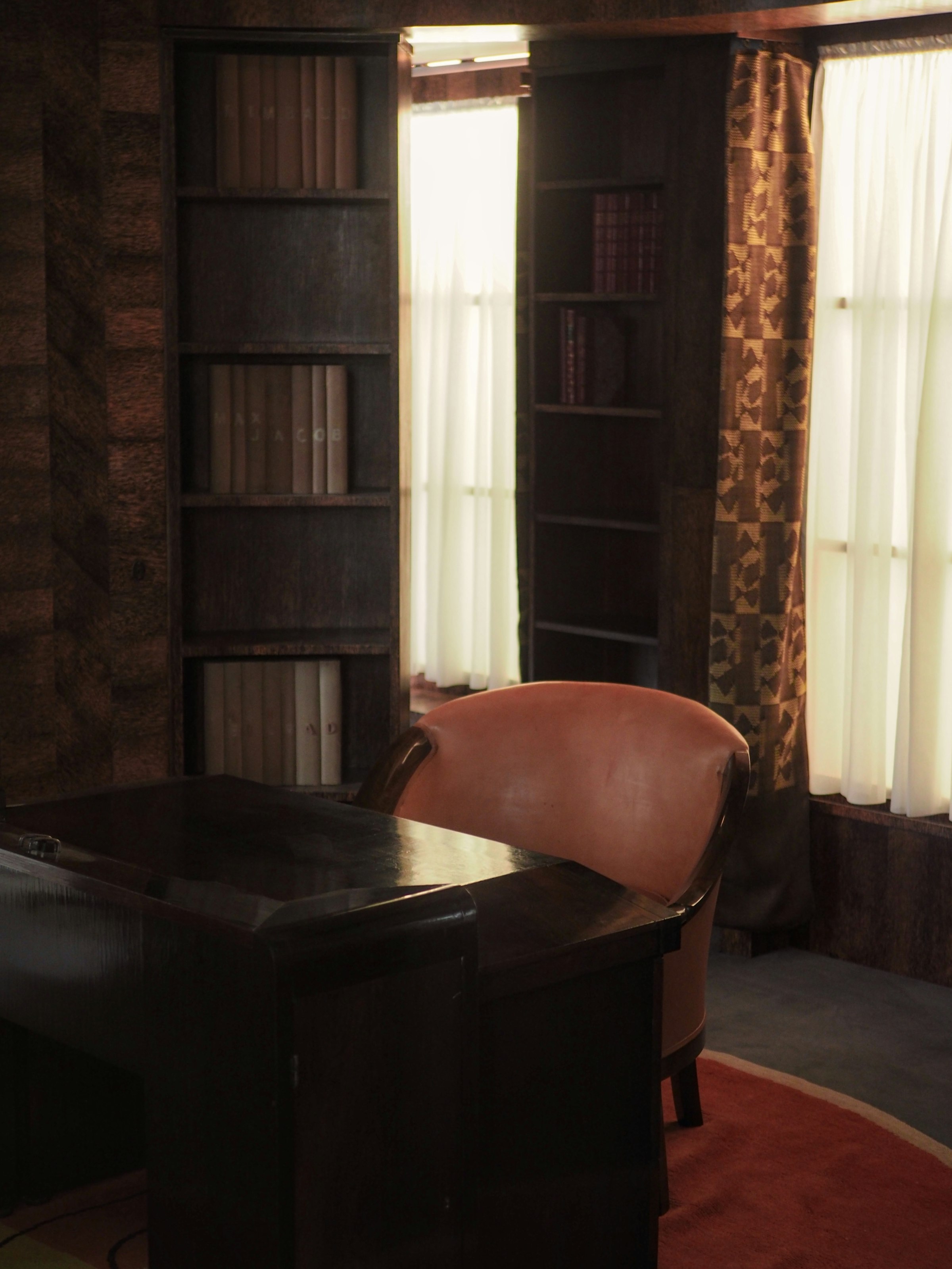 Executive study with bookshelves, where the writing gets done